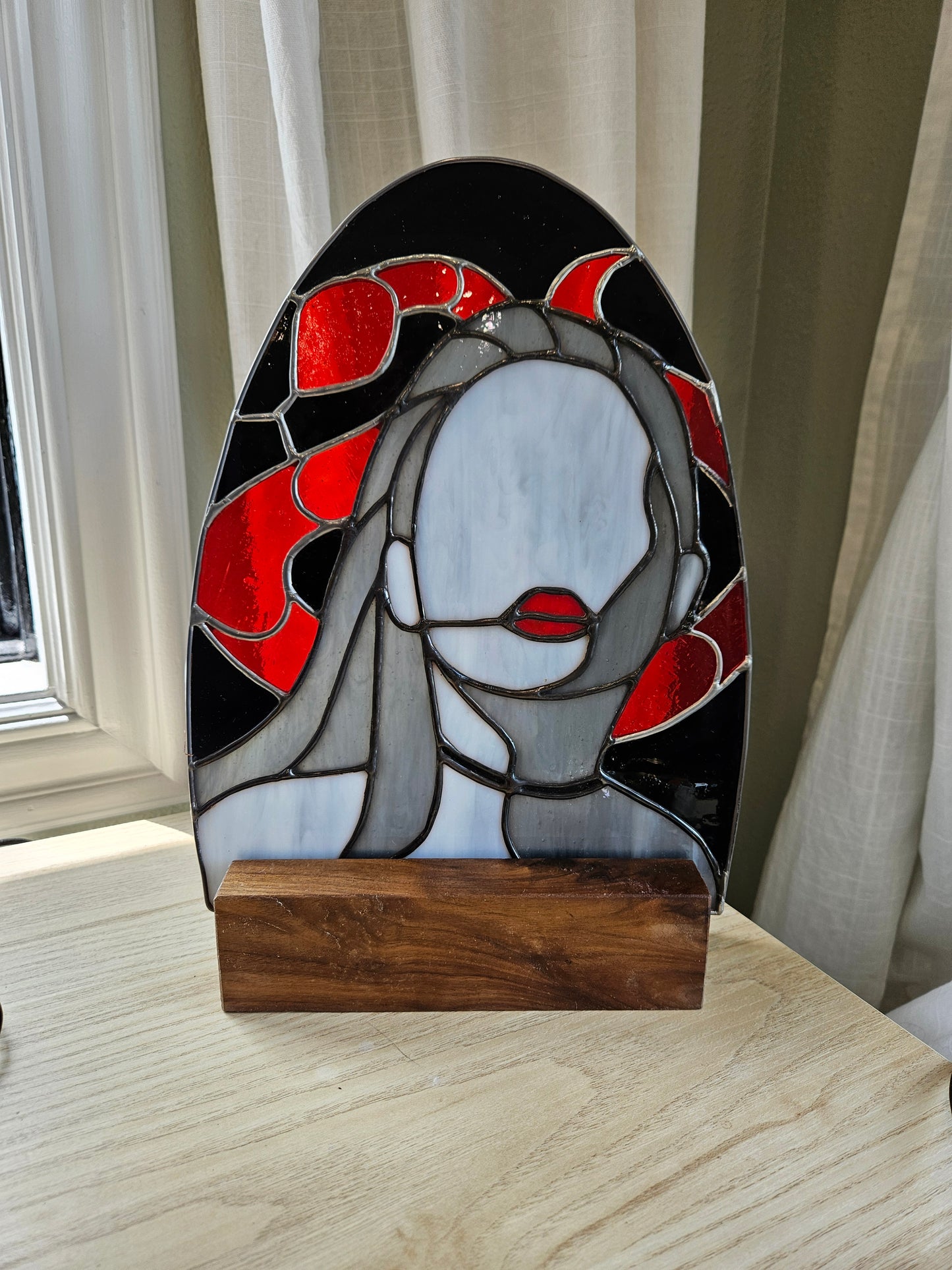 "Woman With Snake" Stained Glass with Walnut Stand